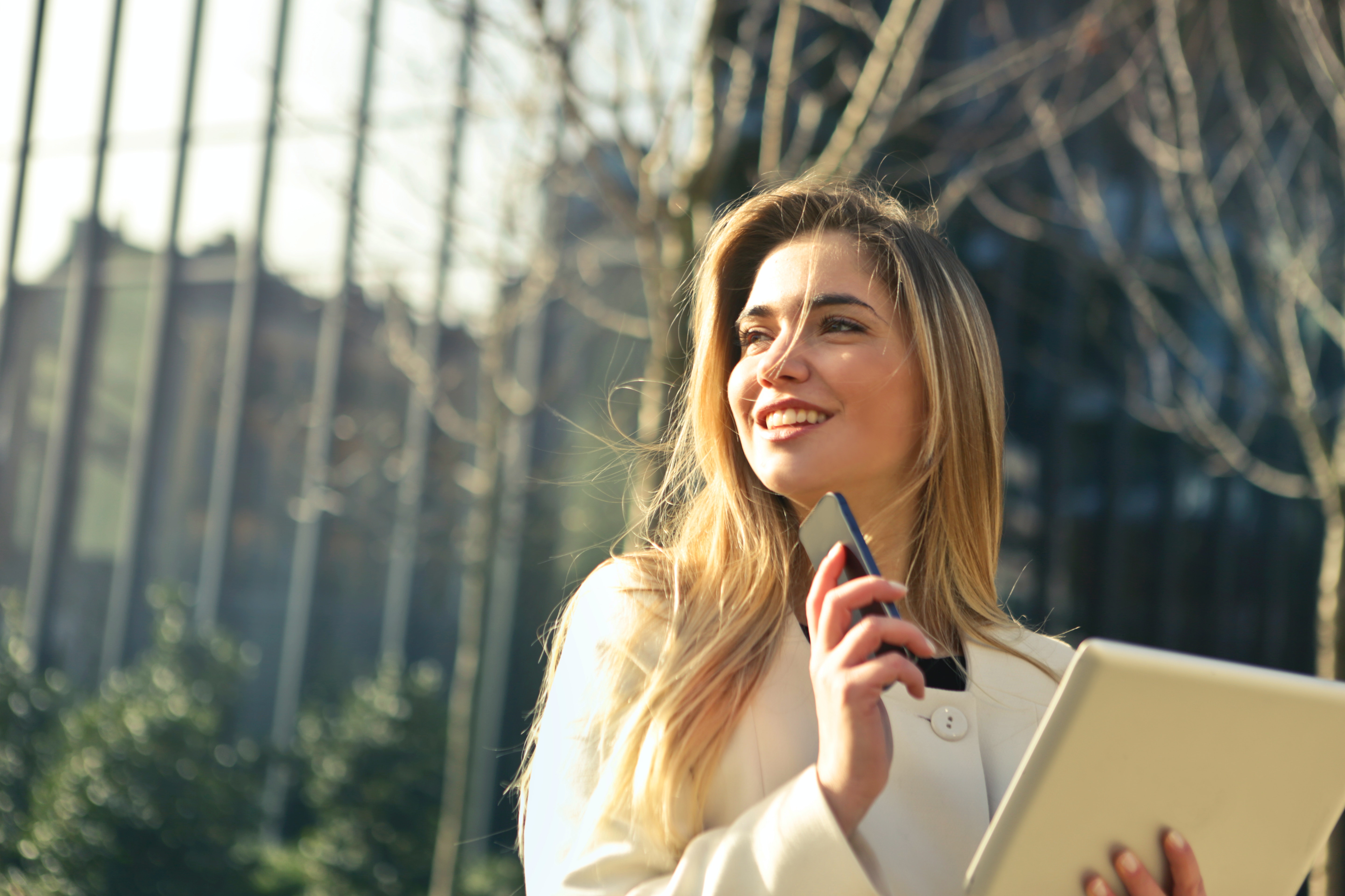 Woman walking and talking on phone